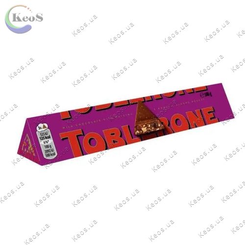 Шоколад Toblerone Молочний шоколад з родзинками і нугою з меду і Мигдалю 100 г.
